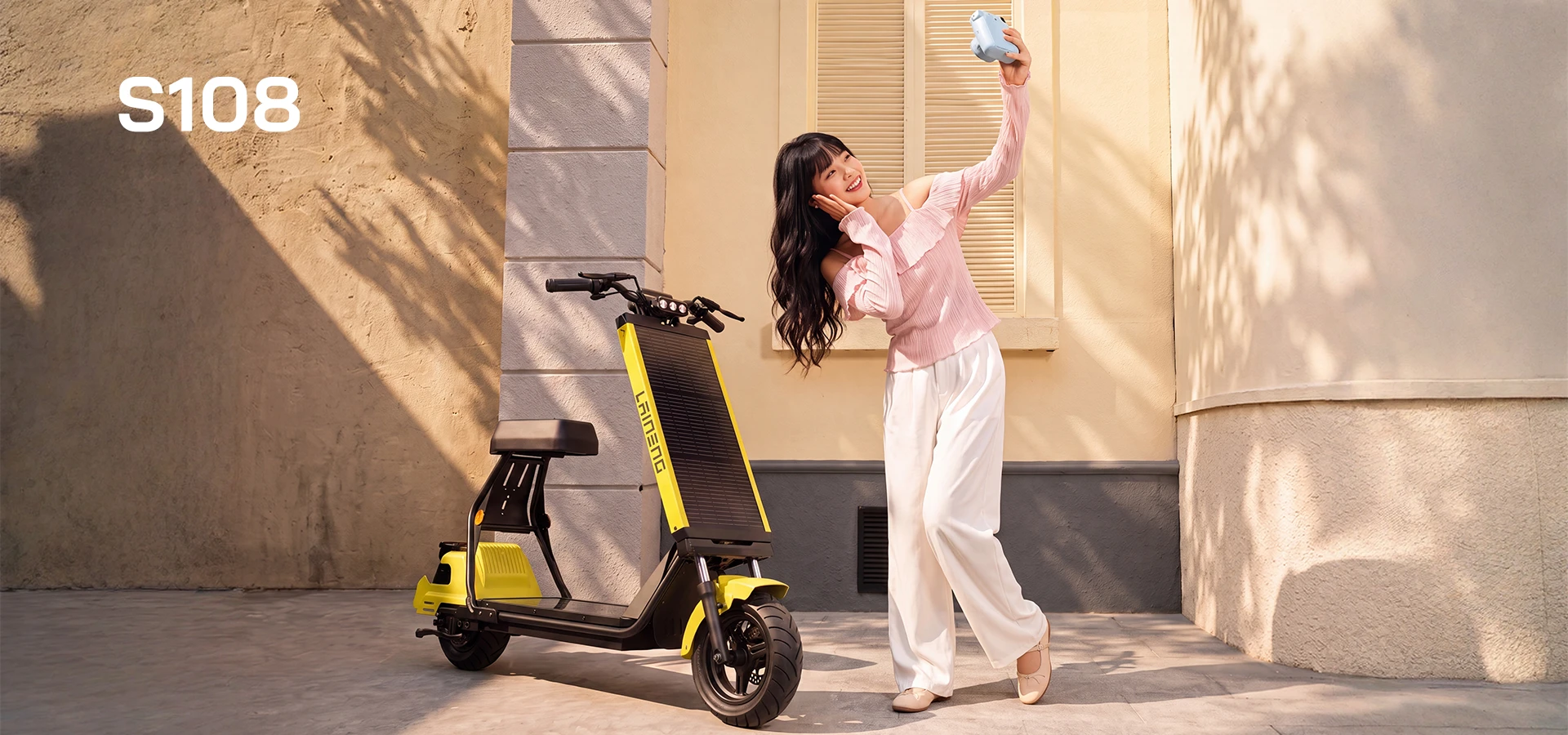 Laineng S108 solar saddle scooter with solar panel, side view